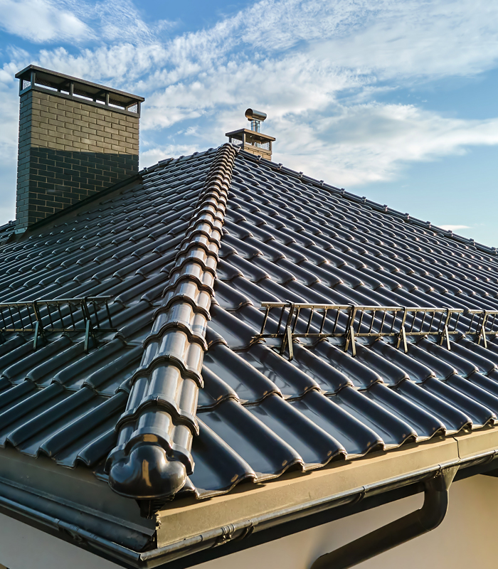http://Residential%20building%20in%20Yonkers,%20Westchester%20County%20with%20slate%20roof%20and%20chimney,%20serviced%20by%20Western%20Family%20Solutions%20LLC,%20experts%20in%20Yonkers%20Roofing.